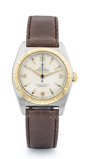 Rolex ROLEX, REF. 5010, RETAILED BY SERPICO Y LAINO A fine, self-winding stainless steel a