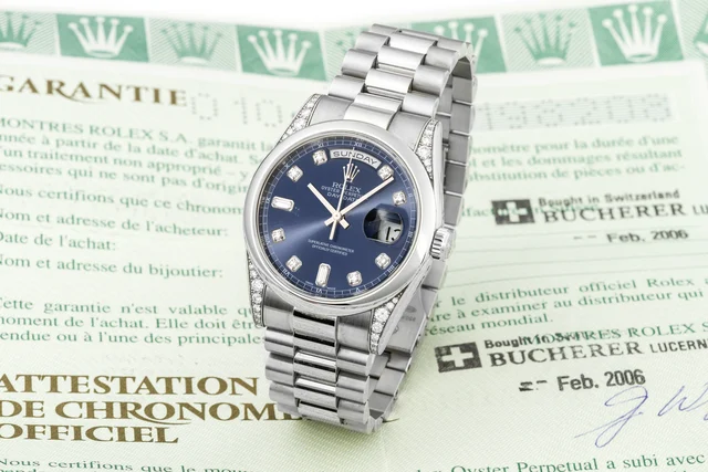 Rolex ROLEX, REF. 118296, DAY-DATE, DIAMOND DIAL AND LUGS, PLATINUM A fine, heavy, self-wi