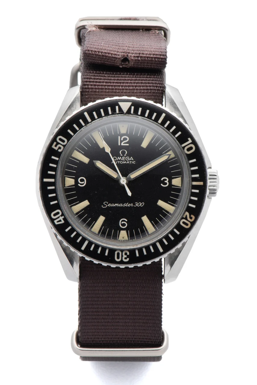 OMEGA OMEGA , REF. 165.024, SEAMASTER 300 A fine, self-winding, stainless steel divers wristwatch with bakelite bezel. kol saati