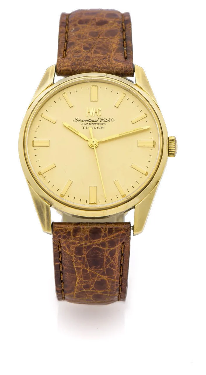 Iwc Retailed By Turler IWC RETAILED BY TURLER REF. 910 YELLOW GOLD A very fine manual-winding 14K yellow gold wristwatch. kol saati