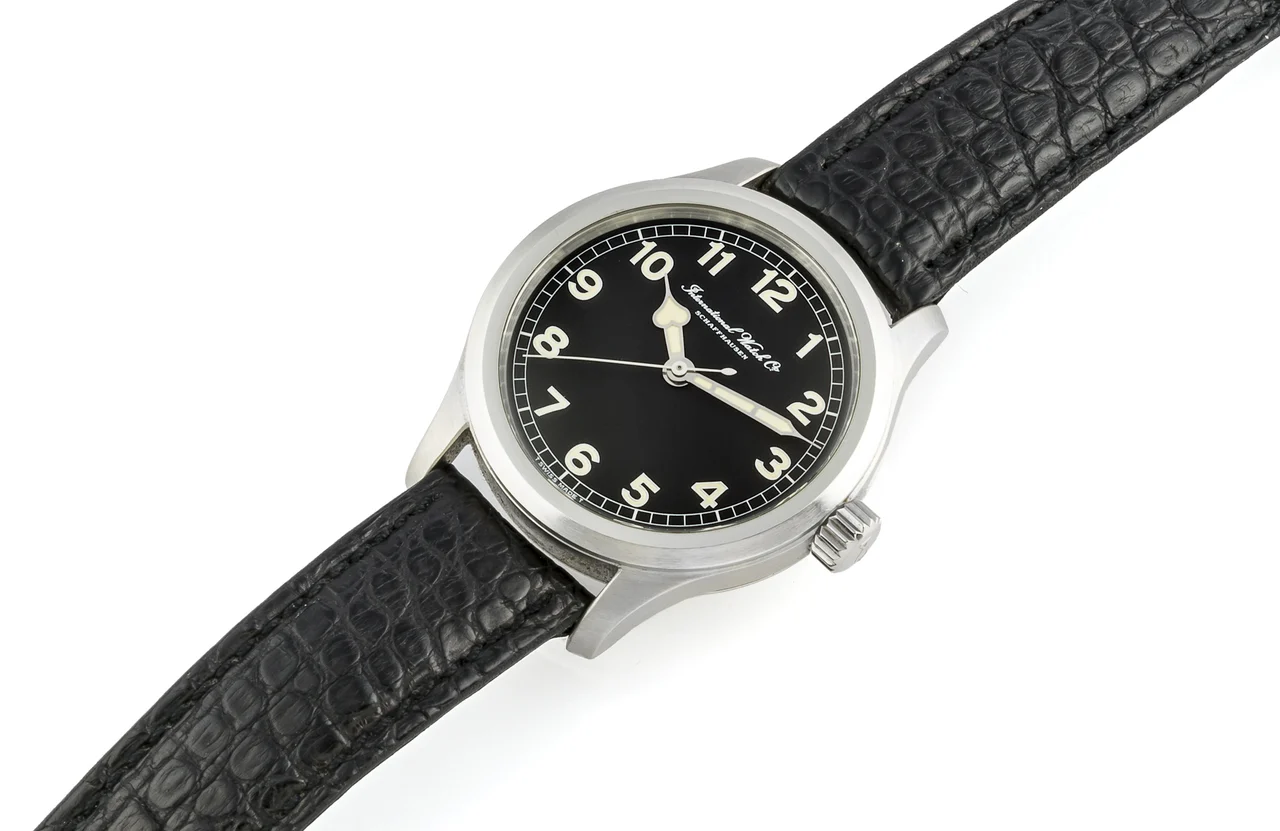 Iwc Die Fliegeruhr Mark Xii IWC DIE FLIEGERUHR MARK XII REF. 3241 PLATINUM LIMITED EDITION N.313/500 Fine and very rare, self-winding, platinum wristwatch, with Mark IX dial. kol saati