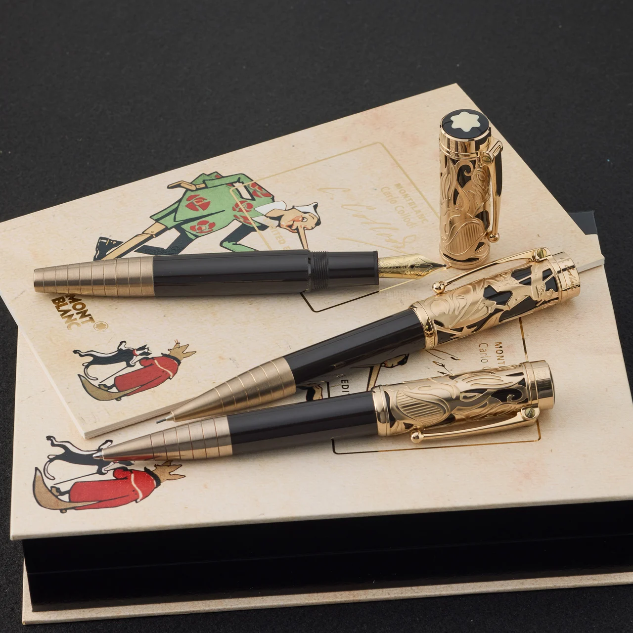 Montblanc MONTBLANC, REF. 106644, WRITERS EDITION: CARLO COLLODI, A SET OF THREE WRITING INSTRUMENTS, LIMITED EDITION, DARK BROWN RESIN AND CHAMPAGNE GOLD kol saati