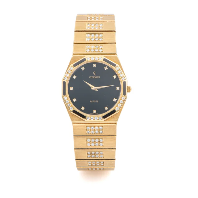 Concord Watch Ref. 51.81.115, quartz, black dial, integrated bracelet; “Mariner”; 18K yell