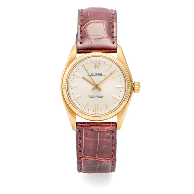 Rolex Ref. 6751, self-winding, centre-seconds, silver “sunburst” dial; 18K yellow gold kol
