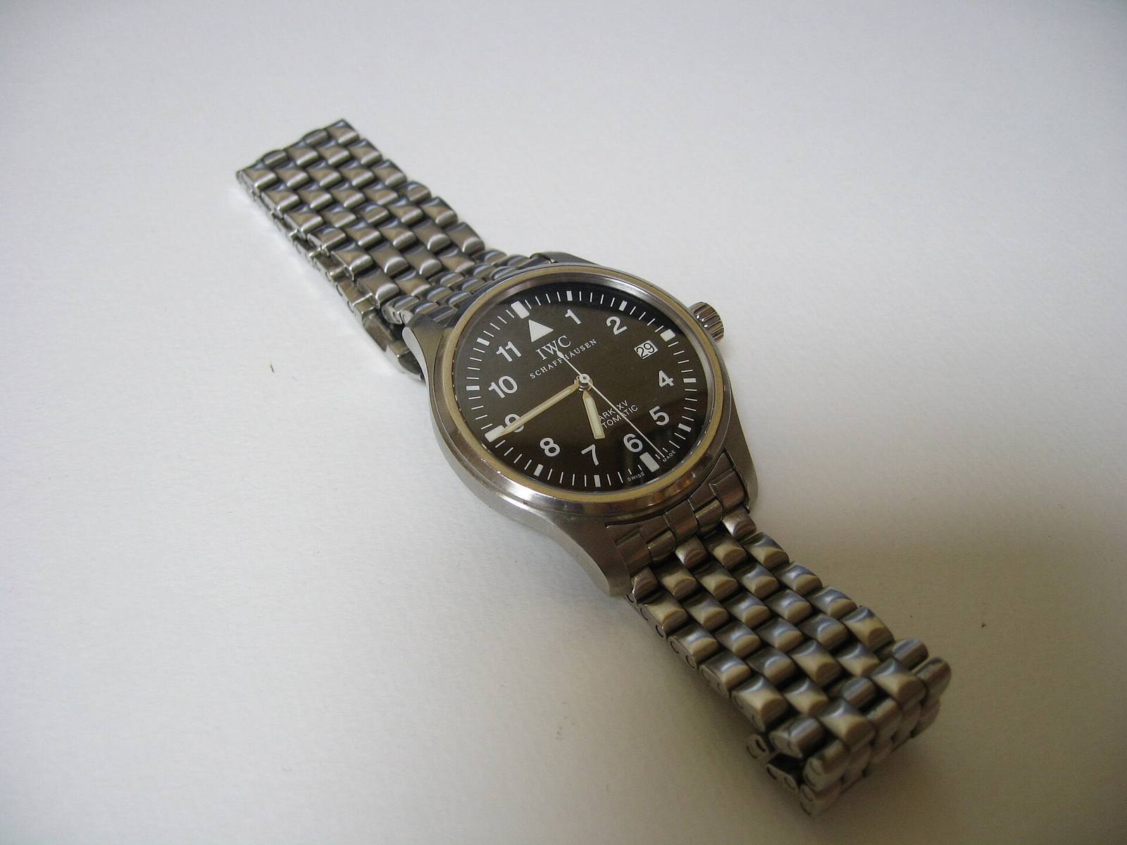 IWC Pilot vs Portugieser — iki kapı görseli